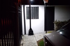 farol frente casa